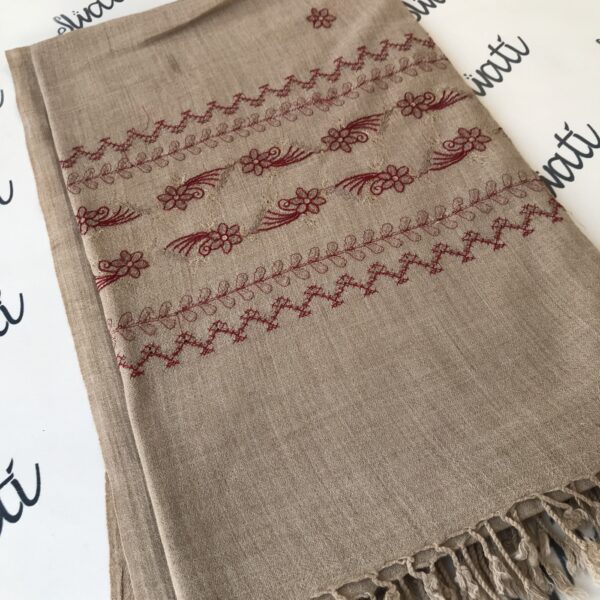 Women shawl woolen with light almond color and maroon machine embroidery