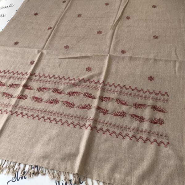 Women shawl woolen with light almond color and maroon machine embroidery